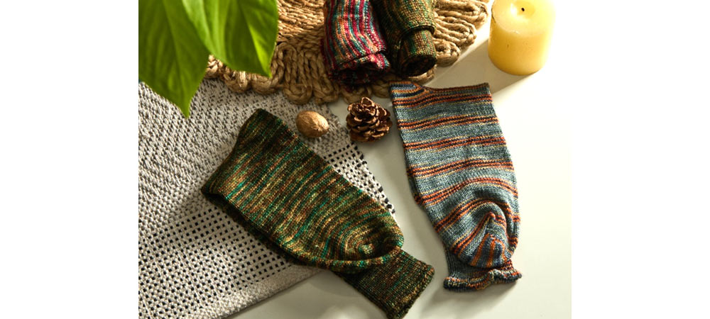 Socks crafted using Terra  Symfonie Yarns